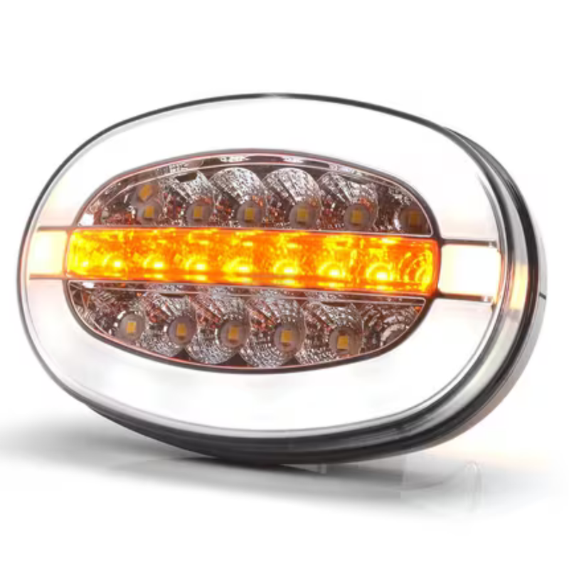 Farol dianteiro LED multifunções, oval, 12-24 V, 136,4x91x40 mm
